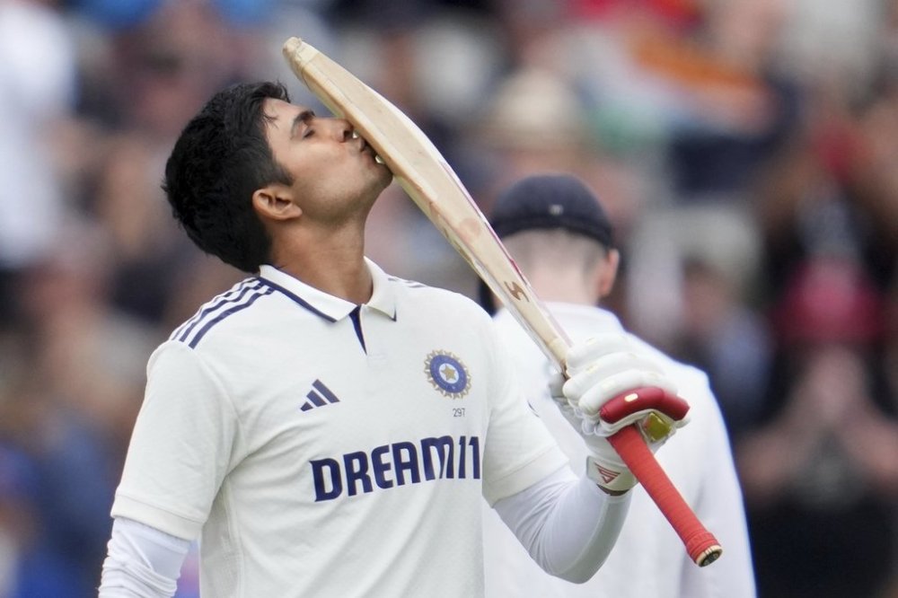 India's captain Shubman Gill celebrates after scoring a century on the final day of the fourth cricket test match between England and India at Emirates Old Trafford, Manchester, England, July 27, 2025.(AP Photo/Jon Super)