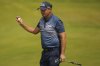Padraig Harrington of Ireland acknowledges the crowd on the 7th green during the second round of the British Open golf championship at the Royal Portrush Golf Club, Northern Ireland, Friday, July 18, 2025. (AP Photo/Francisco Seco)