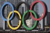 FILE - The Olympic rings are reinstalled after being taken down for maintenance ahead of the postponed Tokyo 2020 Olympics in the Odaiba section in Tokyo, Dec. 1, 2024. (AP Photo/Eugene Hoshiko, File)