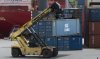 A forklift moves a container around a freight terminal, in St. John's, Sunday, June 25, 2023. THE CANADIAN PRESS/Adrian Wyld