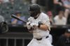 Chicago White Sox's Chase Meidroth (10) is hit in the hand with a pitch from Philadelphia Phillies starting pitcher Taijuan Walker (99) during the fifth inning of a baseball game Wednesday, July 30, 2025, in Chicago. (AP Photo/Erin Hooley)