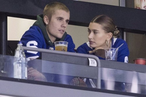Justin Bieber watches alongside his wife Hailey Baldwin, right, during NHL hockey action between the Philadelphia Flyers and the Toronto Maple Leafs, in Toronto on Saturday, Nov. 24, 2018. THE CANADIAN PRESS/Chris Young