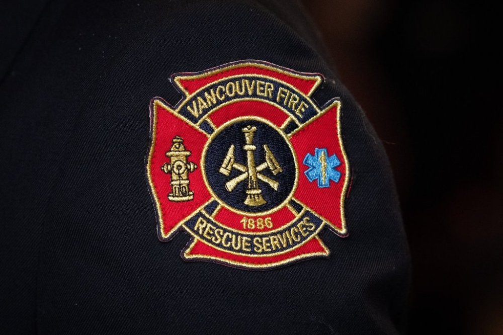 A badge is seen during an unveiling event for the first electric fire truck in Canada at the Vancouver Fire and Rescue Services Training Centre in Vancouver B.C., on Monday, Dec. 4, 2023. THE CANADIAN PRESS/Ethan Cairns