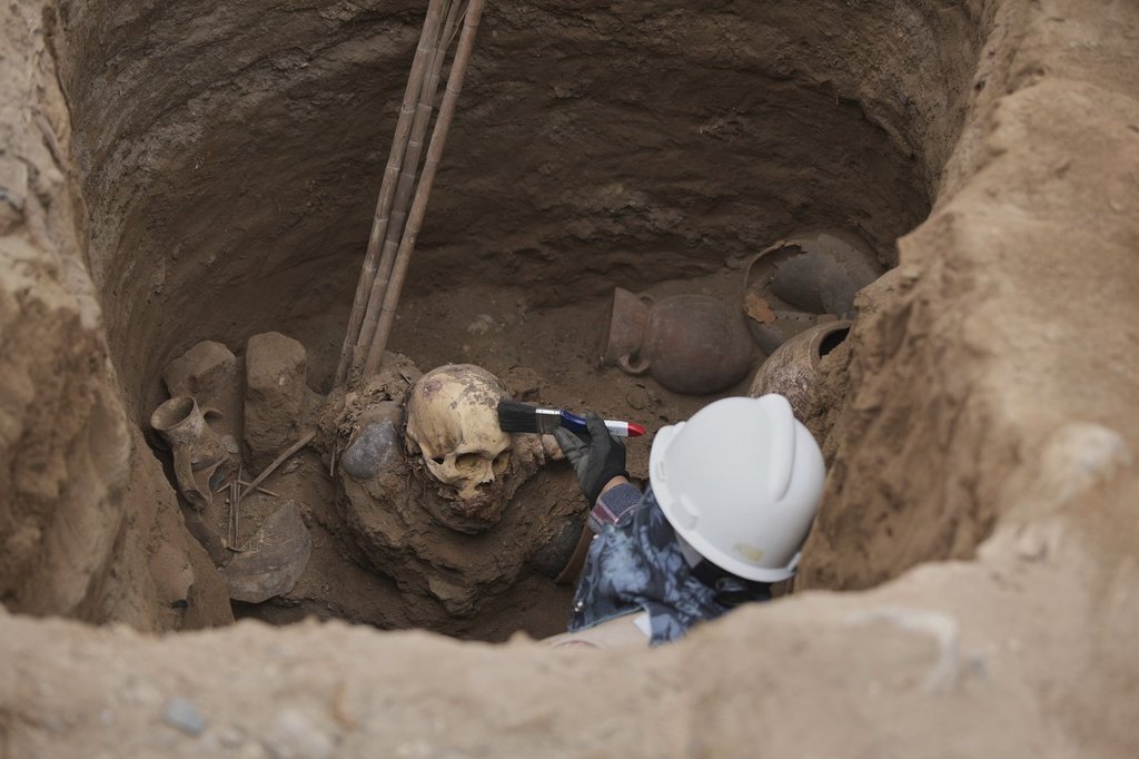 Utility workers in Peru unearth pre-Incan tomb with 1,000-year-old ...