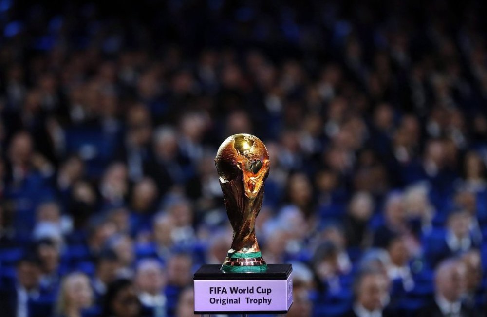 FILE - In this Friday, Dec. 1, 2017, file photo, the World Cup trophy is placed on display during the 2018 soccer World Cup draw in the Kremlin in Moscow. (AP Photo/Alexander Zemlianichenko)