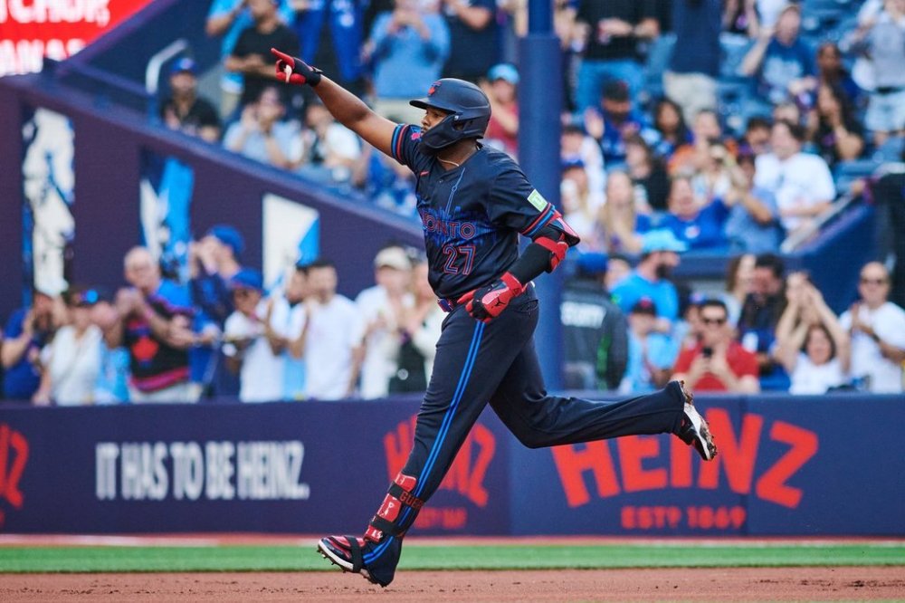 Toronto Blue Jays first base Vladimir Guerrero Jr. (27) rounds the bases after hitting a home run against the Kansas City Royals during first inning MLB baseball action in Toronto, Friday, Aug. 1, 2025. THE CANADIAN PRESS/Sammy Kogan