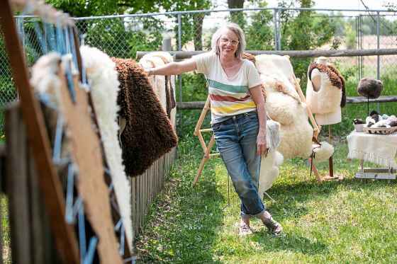 LeVerne Tucker with sheep hides on her farm near Teulon. (Mikaela MacKenzie / Free Press)