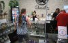 Ruth Bonneville  / Free Press 

Local Character CO.

Photo of  Shira Bellan  owner of Character CO. Shop  at 2090 Corydon Ave., helping a customer Wednesday. 

Story about prices going up and possible rules for window coverings for cannabis shops.

July 2nd,   2025
