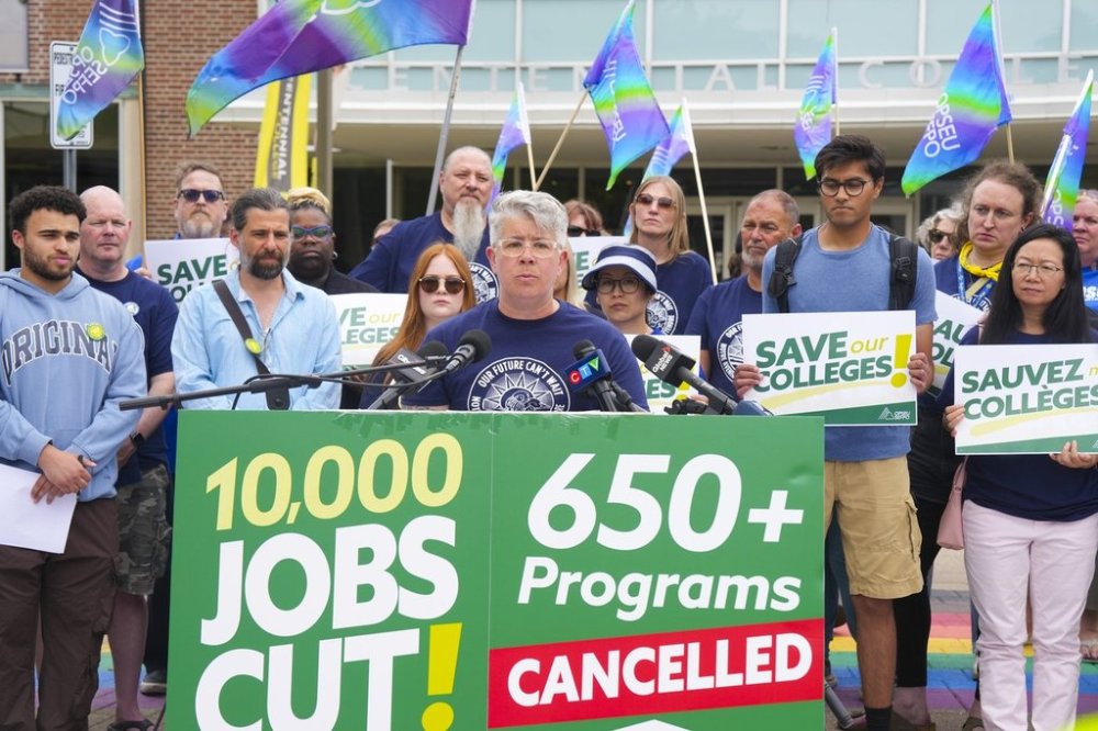 JP Hornick, President of OPSEU/SEFPO, stands with supporters outside of Centennial College in Toronto on Wednesday July 9, 2025. THE CANADIAN PRESS/Chris Young