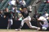 Arizona Diamondbacks' Blaze Alexander hits a single that scored a run during the ninth inning of a baseball game against the Athletics, Sunday, Aug. 3, 2025, in West Sacramento, Calif. (AP Photo/Scott Marshall)