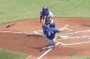 Kansas City Royals first base Vinnie Pasquantino (9) scores in front Toronto Blue Jays catcher Alejandro Kirk after a sacrifice fly from Royals' Mike Yastrzemski during fourth inning MLB baseball action in Toronto on Sunday August 3, 2025. THE CANADIAN PRESS/Chris Young