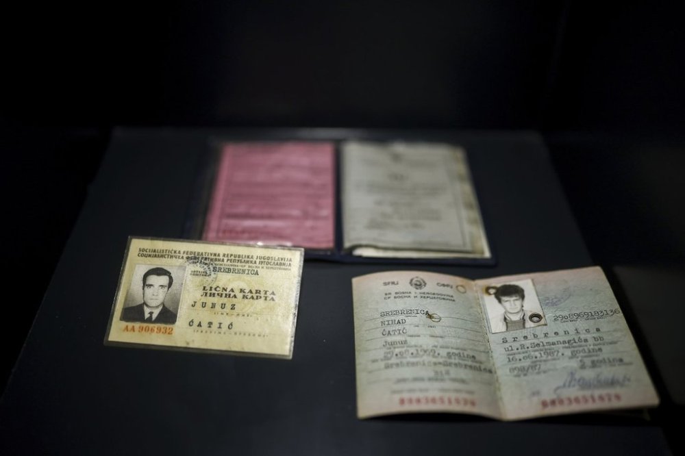 Personal documents found in a mass grave are shown as a part of the exhibition