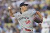 Minnesota Twins pitcher David Festa throws against the Los Angeles Dodgers during the second inning of a baseball game in Los Angeles, Monday, July 21, 2025. (AP Photo/Jayne Kamin-Oncea)