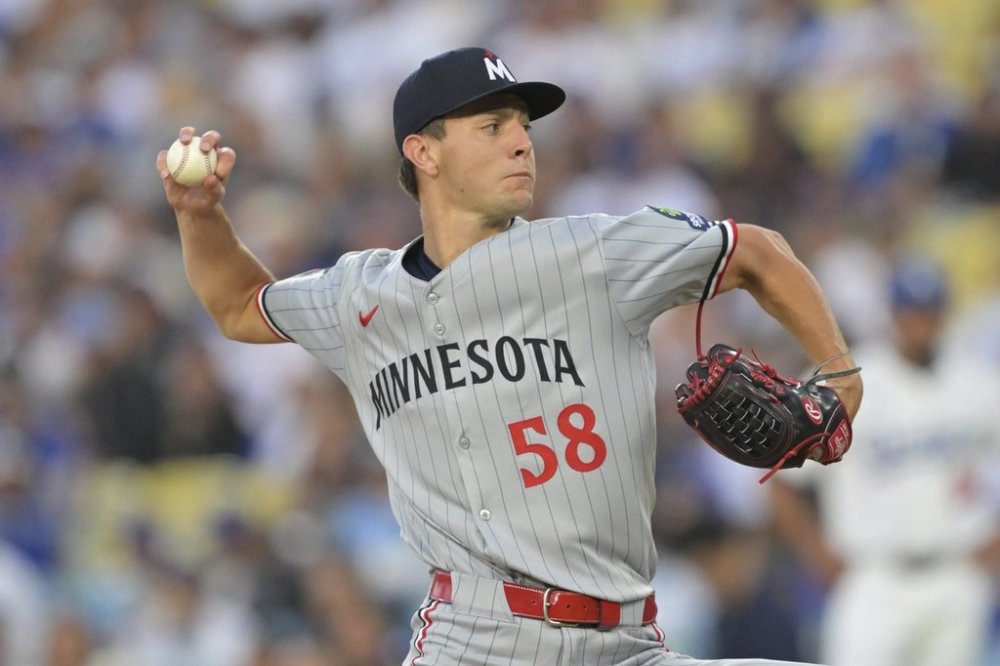 Minnesota Twins pitcher David Festa throws against the Los Angeles Dodgers during the second inning of a baseball game in Los Angeles, Monday, July 21, 2025. (AP Photo/Jayne Kamin-Oncea)