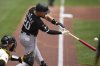 Chicago White Sox's Miguel Vargas (20) hits a three-run home run off Pittsburgh Pirates pitcher Andrew Heaney during the first inning of a baseball game in Pittsburgh, Sunday, July 20, 2025. (AP Photo/Gene J. Puskar)