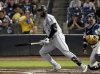Chicago White Sox Luis Robert Jr. watches his two-run single during the third inning of a baseball game against the Tampa Bay Rays, Monday, July 21, 2025, in Tampa, Fla. (AP Photo/Jason Behnken)