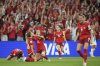 Switzerland players react at the end of the Euro 2025, group A, soccer match between Finland and Switzerland at Stade de Geneve in Geneva, Switzerland, Thursday, July 10, 2025. (AP Photo/Alessandra Tarantino)