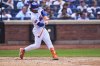 New York Mets' Francisco Lindor hits an RBI single during the fourth inning of a baseball game against the Los Angeles Angels Wednesday, July 23, 2025, in New York. (AP Photo/Frank Franklin II)