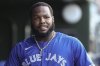 Toronto Blue Jays first baseman Vladimir Guerrero Jr. gets ready in the dugout before a baseball game against the Athletics Saturday, July 12, 2025, in West Sacramento, Calif. (AP Photo/Sara Nevis)