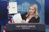 White House press secretary Karoline Leavitt speaks as she holds up a letter from President Donald Trump to South Korea's President Lee Jae-myung during a press briefing at the White House, Monday, July 7, 2025, in Washington. (AP Photo/Evan Vucci)