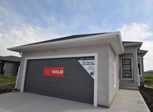 TODD LEWYS / FREE PRESS
                                The beautifully designed condos in The Villas of Grande Pointe Meadows come in different sizes, styles, finishes and price points.