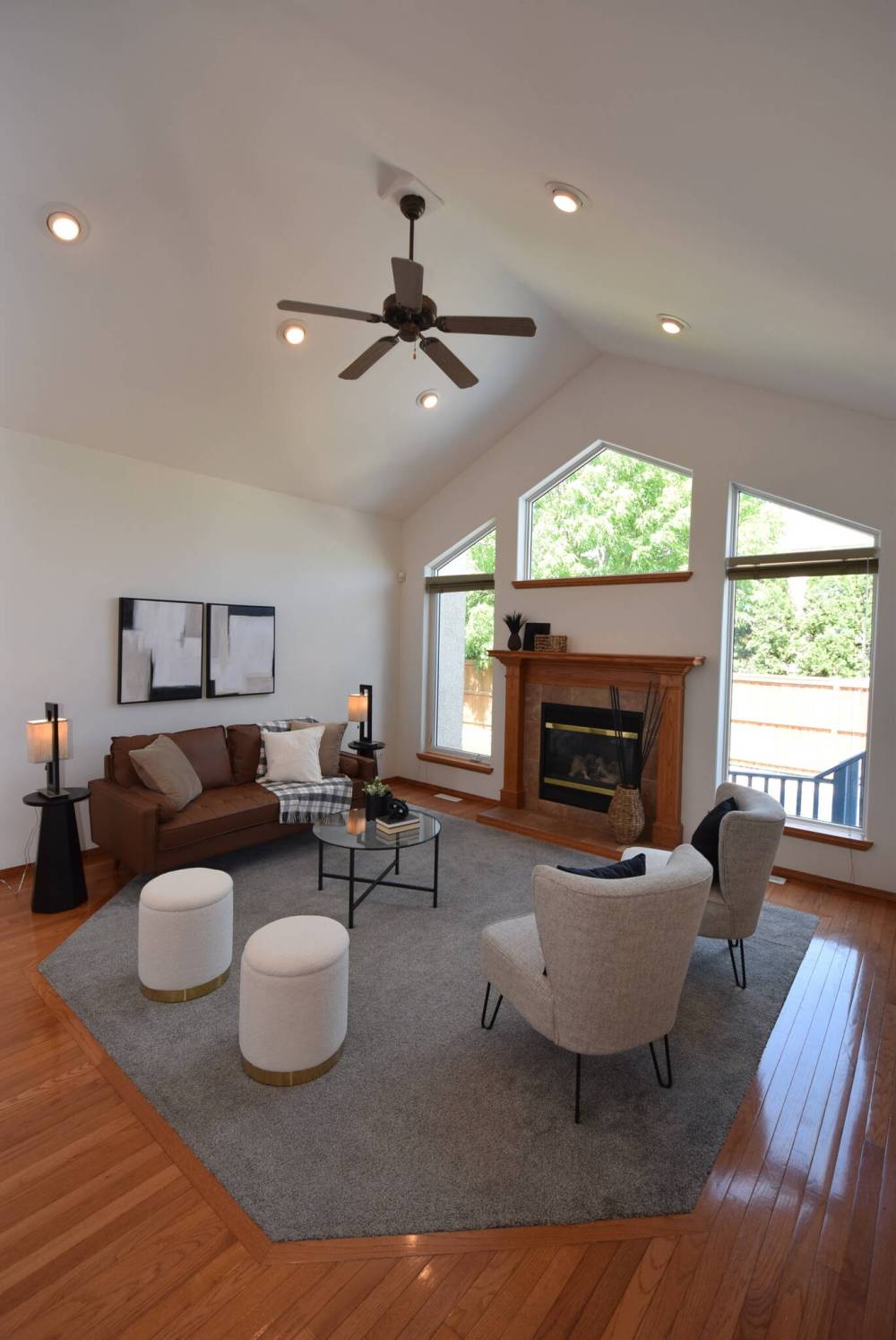 TODD LEWYS / FREE PRESS
With its vaulted ceiling and fireplace framed by a lovely collection of windows, the great room is an impressive space.