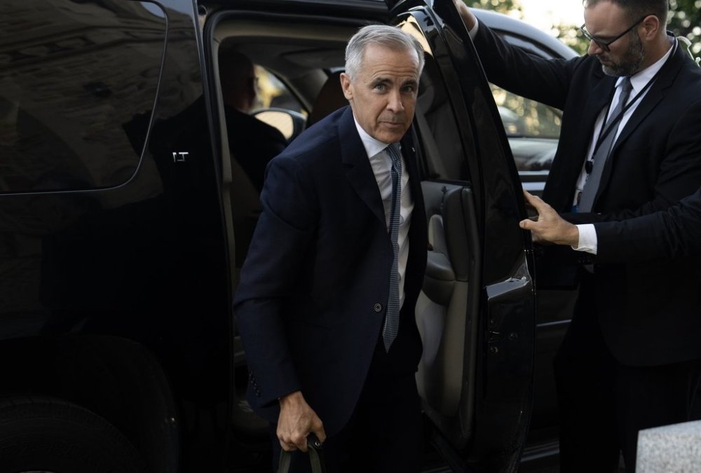 Prime Minister Mark Carney arrives on Parliament Hill ahead of meetings in Ottawa, Monday, July 21, 2025. THE CANADIAN PRESS/Adrian Wyld