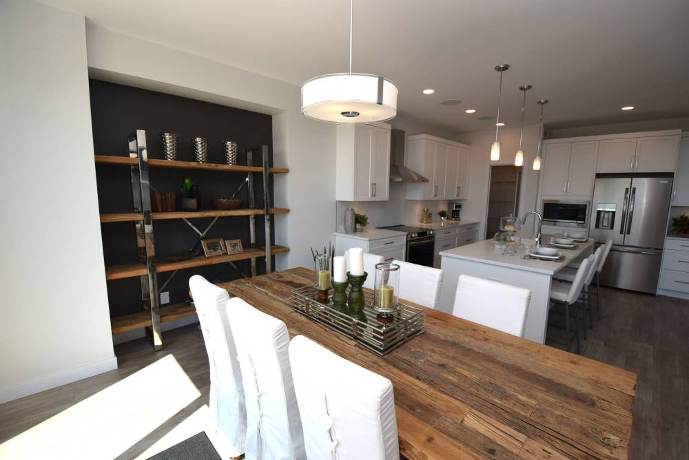 TODD LEWYS / FREE PRESS
The sunny, spacious dining area flows naturally into the crisp white kitchen.