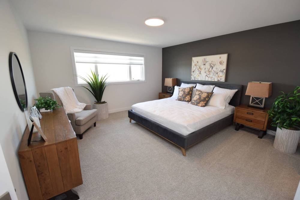 TODD LEWYS / FREE PRESS
The primary bedroom is a private, peaceful space.