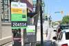 MATTHEW FRANK / FREE PRESS
                                New PayByPhone app parking signs have been put up across downtown with QR codes that will direct drivers to a payment site.