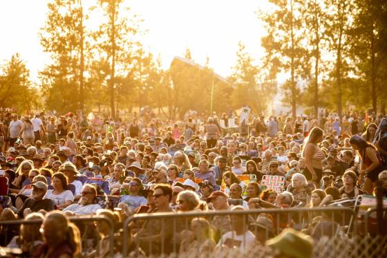 The crowd listens to Allison Russell on the main stage as the sun sets at Folk Fest on Thursday. (Mikaela MacKenzie / Free Press)