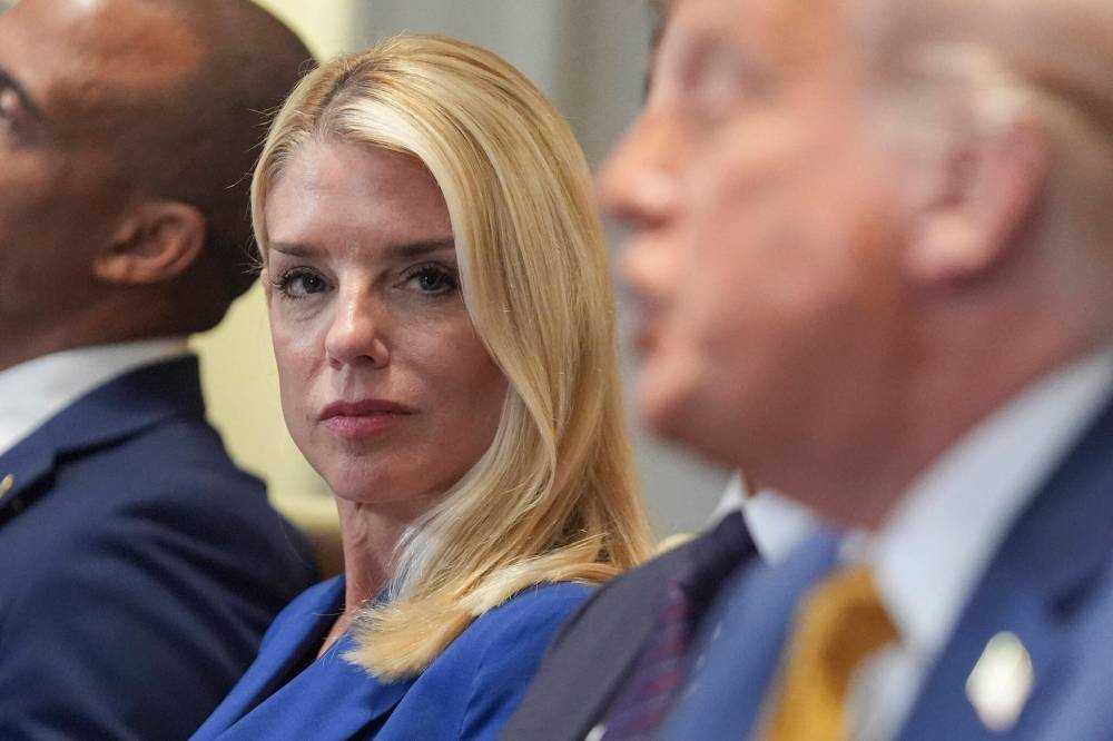 The Associated Press
U.S. Attorney General Pam Bondi (left) is the new target of MAGA wrath after the much-hyped Jeffrey Epstein
investigation turned out to be a bust.