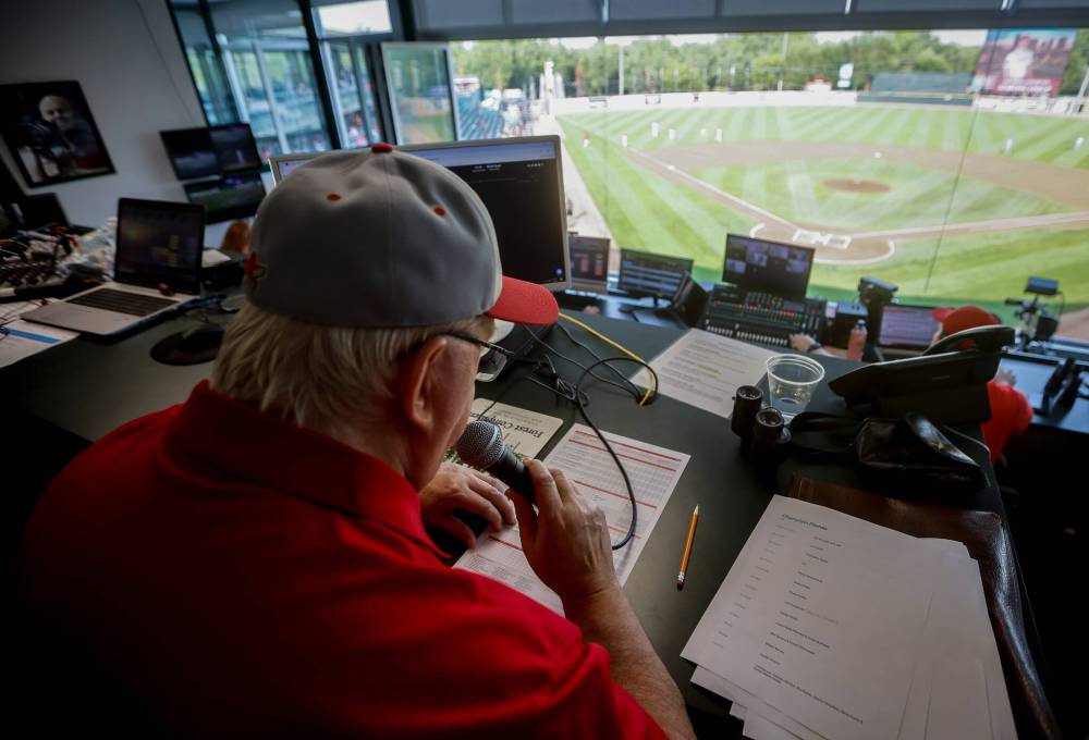 JOHN WOODS / FREE PRESS
While poor eyesight derailed any hope of playing baseball successfully as a child, Arnst grew up loving the call of major league games broadcast over distant radio stations.