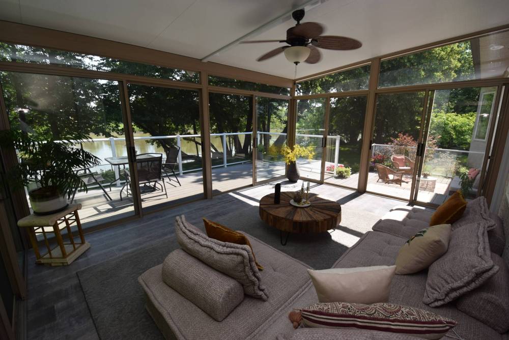 Todd Lewys photos / Free Press
The three-season sunroom at 4 Deerwood Pl., Headingley, looks out onto the surrounding deck area as well as the Assiniboine River.