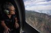 Arizona Gov. Katie Hobbs looks out of a helicopter window during her aerial tour of wildfire damage along the Grand Canyon's North Rim, Ariz., Saturday, July 19, 2025. (Joe Rondone/The Arizona Republic via AP, Pool)