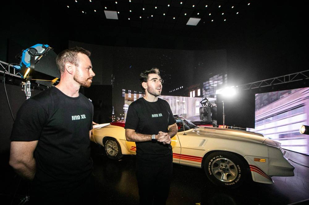 MIKAELA MACKENZIE / FREE PRESS
Reid Valmestad (left) and Austin MacKay, co-founders of CoPilot Co, explain the demonstration of the AVRO XR virtual production studio on Wednesday.