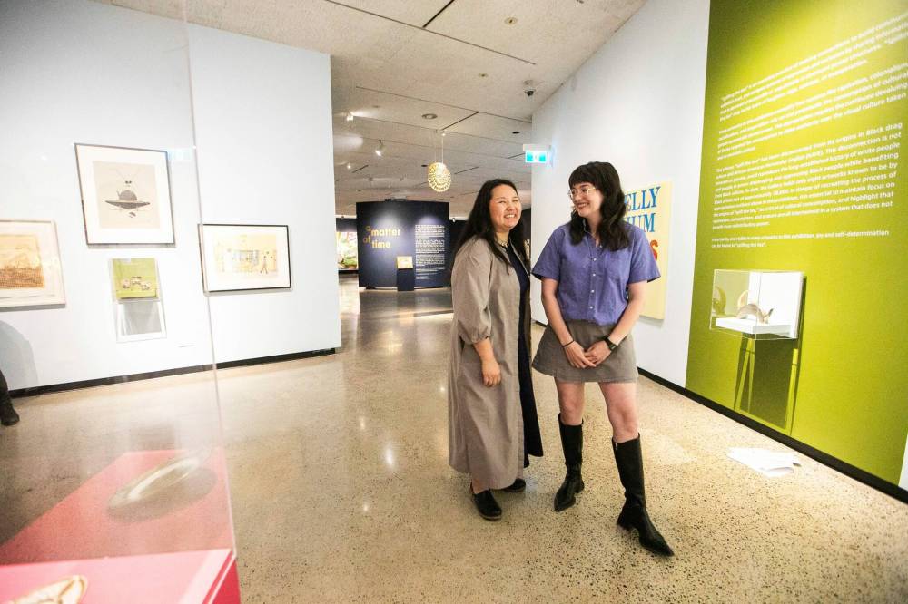 MIKAELA MACKENZIE / FREE PRESS
Curators Nawang Tsomo Kinkar (left) and Grace Braniff at a preview of the two new shows Crying Over Spilt Tea and a matter of time, both of which display works from Winnipeg Art Gallery’s vast collection.