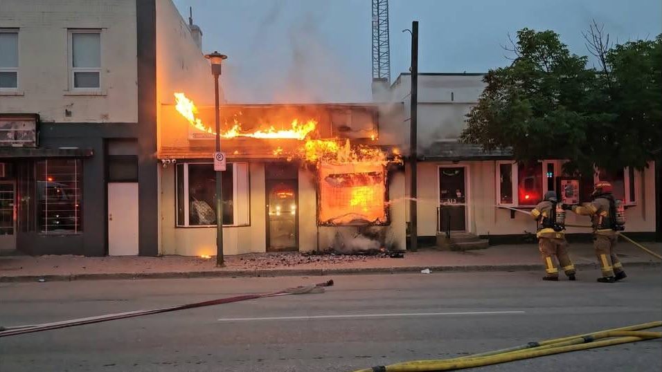SUPPLIED PHOTO
                                Firefighters battle a blaze in the office of CJ104 in Swan River on July 10.