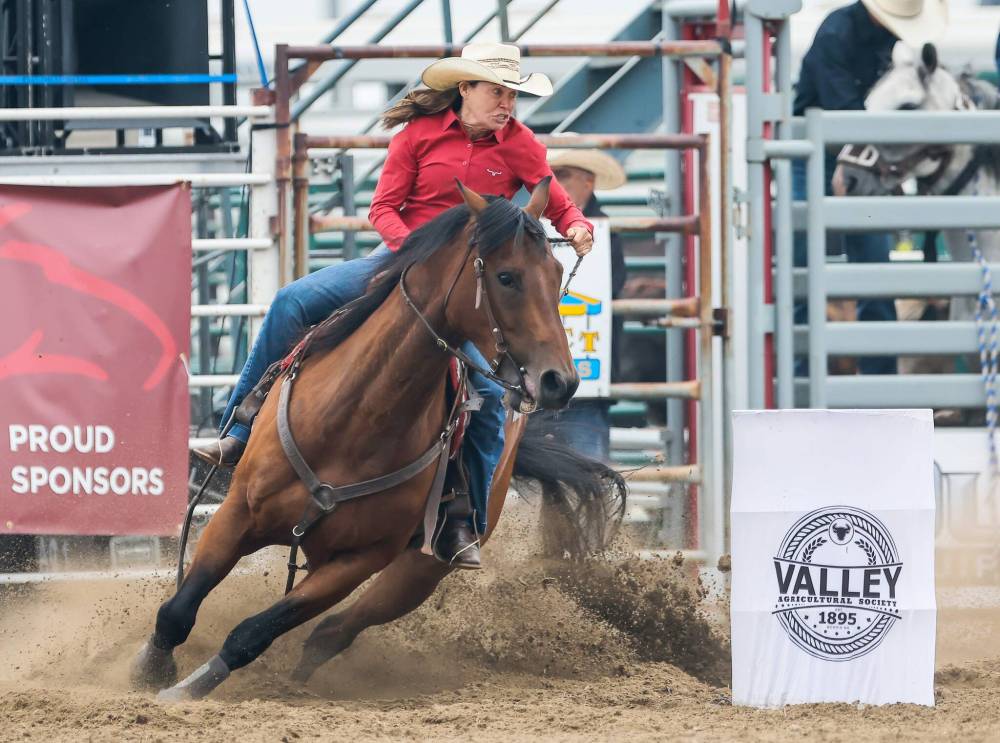 Traci MacDonald competes in and ended up winning the Women’s Barrels at the Manitoba Stampede and Exhibition in Morris Sunday, July 20, 2025. (John Woods / Free Press)