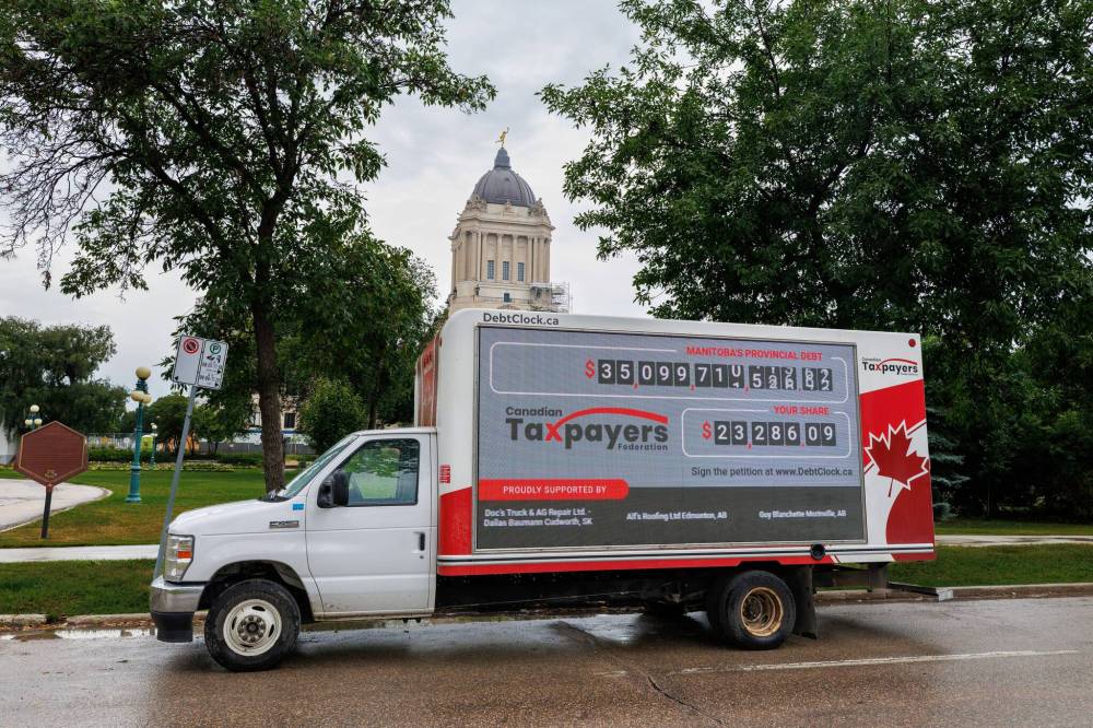 MIKE DEAL / FREE PRESS
The Canadian Taxpayers Federation brought their the Debt Clock to the Manitoba legislature to launch its provincial debt clock tour and sound the alarm about the growing provincial debt.