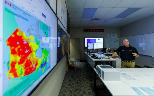 MIKE DEAL / FREE PRESS Stephen Tulle, national duty officer for CIFFC, in the operations centre during a tour of the Canadian Interagency Forest Fire Centre (CIFFC) which is a not-for-profit corporation owned and operated by the federal, provincial and territorial wildland fire management agencies to coordinate resource sharing, mutual aid, and information sharing. CIFFC is also a facilitator of wildland fire cooperation and coordination nationally and internationally in long-range fire management planning, program delivery and human resource strategies. Reporter: Nicole Buffie 250717 - Thursday, July 17, 2025.