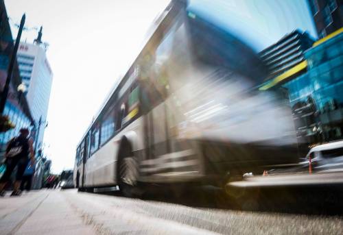 JOHN WOODS / FREE PRESS FILES
                                Winnipeg Transit riders make their way in the new transit system on Portage.
