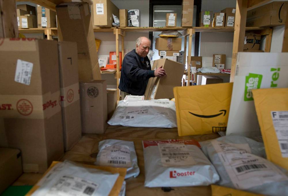 ADRIAN WYLD / THE CANADIAN PRESS FILES
Since 2016, exporters could ship parcels valued at US$800 or less into the United States tax-free. That’s changing, according to an executive order U.S. President Donald Trump signed Wednesday. He’s suspending the global exemption — called the de minimis exemption — starting Aug. 29.