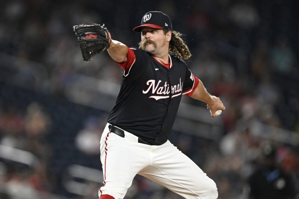 Washington Nationals pitcher Andrew Chafin throws during the sixth inning of a baseball game against the Cincinnati Reds in Washington, Monday, July 21, 2025. (AP Photo/Terrance Williams)
