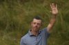 Rory McIlroy of Northern Ireland acknowledges the crowd as he walks onto the 18th green during the final round of the British Open golf championship at the Royal Portrush Golf Club, Northern Ireland, Sunday, July 20, 2025. (AP Photo/Francisco Seco)