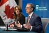 Bank of Canada Senior Deputy Governor Carolyn Rogers looks on as Governor Tiff Macklem speaks during a news conference, in Ottawa, Wednesday, June 4, 2025. A pair of reports from the Bank of Canada say tariff-related uncertainty continued to put a damper on business and consumer sentiment in the second quarter, but the worst-case trade scenarios previously anticipated seem less likely. THE CANADIAN PRESS/Adrian Wyld