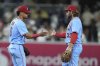 St. Louis Cardinals second baseman Brendan Donovan, right, celebrates with teammate shortstop Masyn Winn after the Cardinals defeated the San Diego Padres 8-5 in a baseball game Saturday, Aug. 2, 2025, in San Diego. (AP Photo/Gregory Bull)