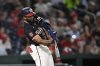 Washington Nationals' Amed Rosario hits a double off Cincinnati Reds pitcher Graham Ashcraft during the sixth inning of a baseball game in Washington, Monday, July 21, 2025. (AP Photo/Terrance Williams)