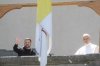 Ukraine President Volodymyr Zelenskyy, left, and Pope Leo XIV wave to journalists during their meeting in Castel Gandolfo, Italy, Wednesday, July 9, 2025. (AP Photo/Gregorio Borgia)