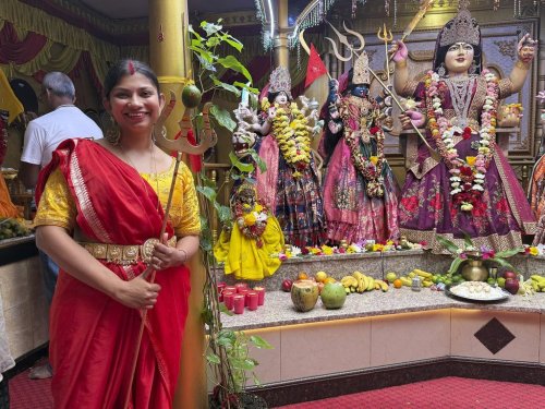 This image provided by the Religion News Service shows Chandni Kalu, a priestess at the Shri Shakti Mariammaa temple, Sunday, July 13, 2025, in the borough of Queens, New York. (Richa Karmarkar/Religion News Service via AP)